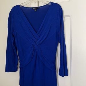 Cute top with ruched midsection.